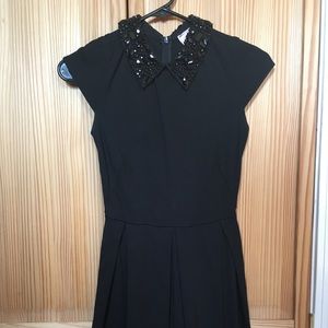 Cocktail dress with jeweled neck detail